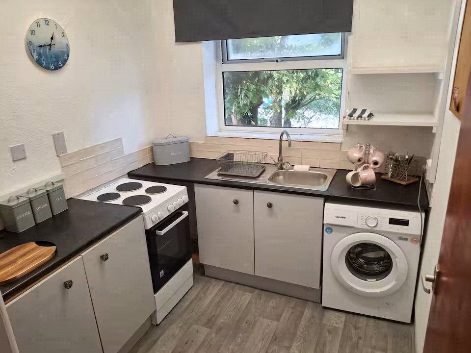 Property photo 3 of 13 Kitchen