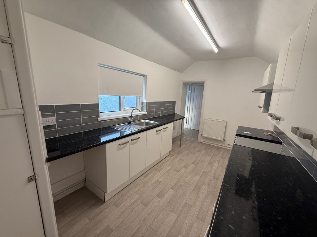 Property photo 2 of 12 Kitchen