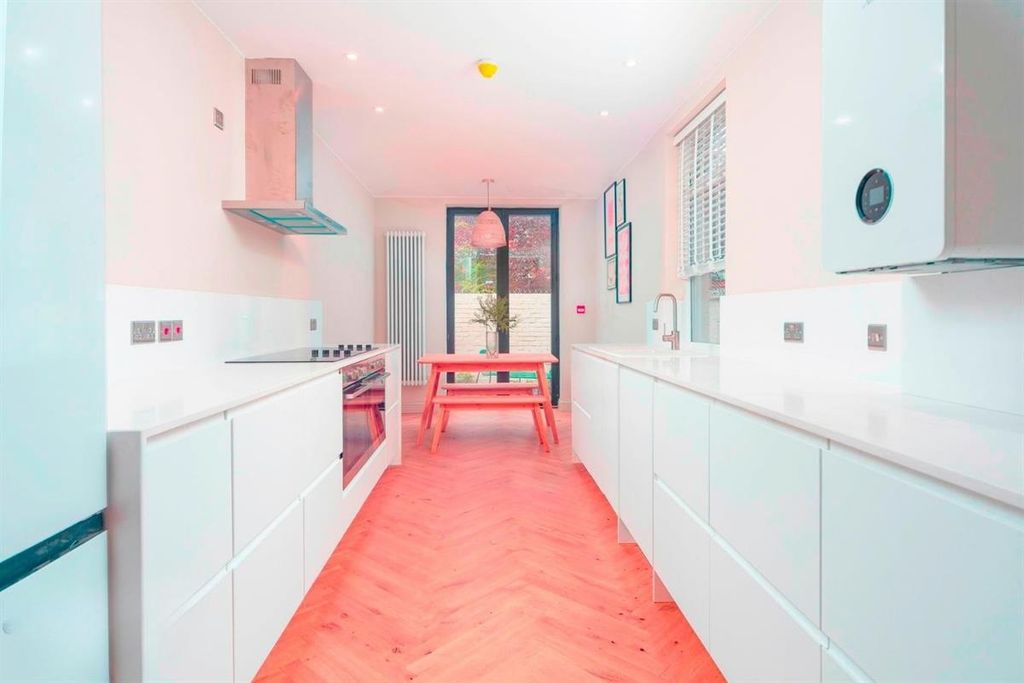 Property photo 3 of 7 Bright Modern Galley Kitchen With Breakfast Table...