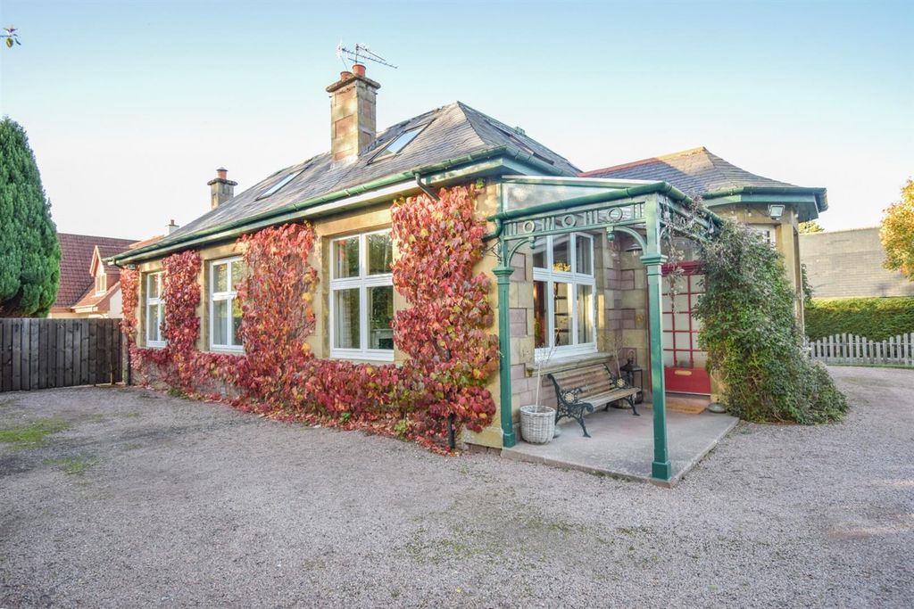 Property photo 2 of 34 Front-Side.Jpg