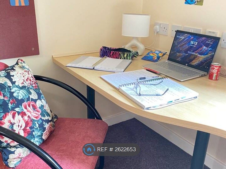 Property photo 3 of 8 Desk Area In Bedroom