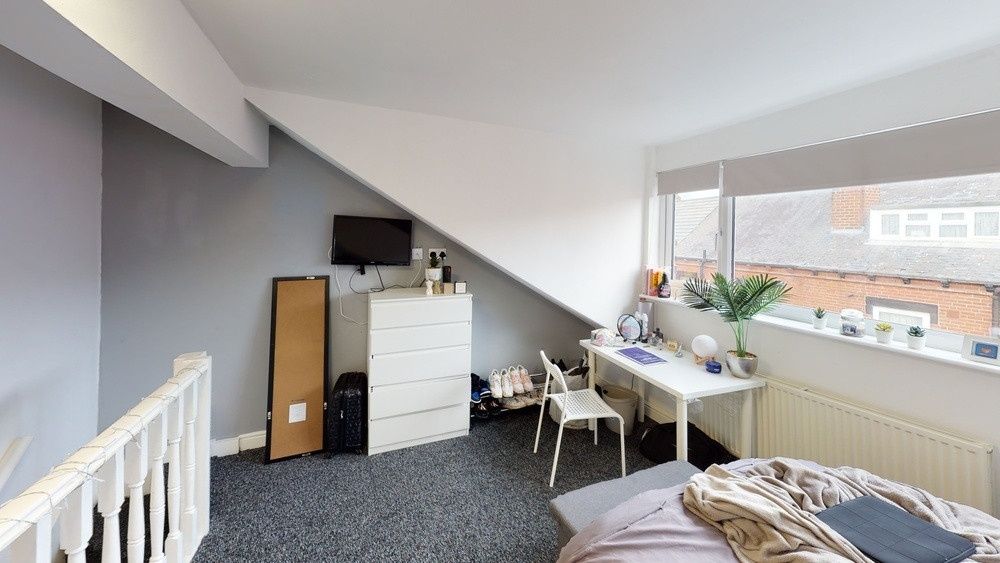 Property photo 3 of 11 Bright And Welcoming Living Room With Ample Natura...