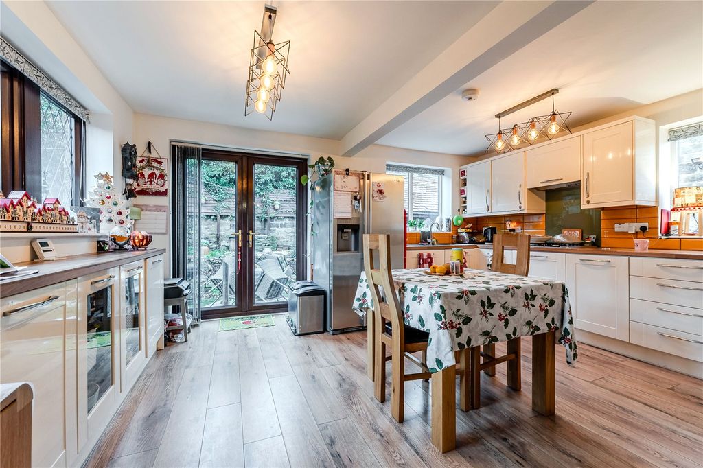 Property photo 3 of 17 Dining Kitchen