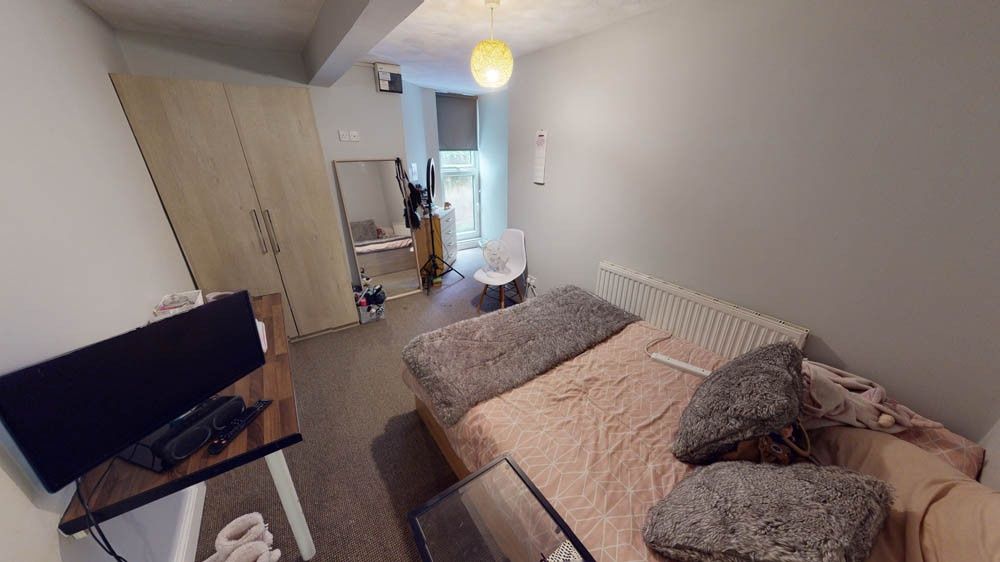 Property photo 1 of 6 A Modern Living Room With A Comfortable Sofa, Ampl...