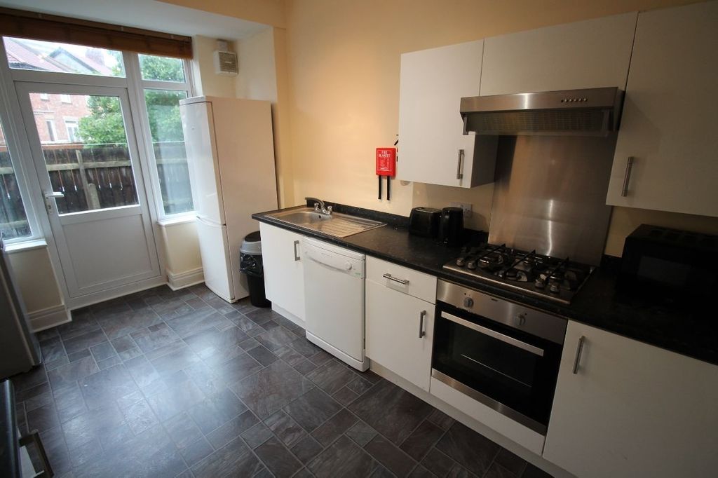 Property photo 2 of 13 A Bright And Modern Kitchen With Ample Storage And...