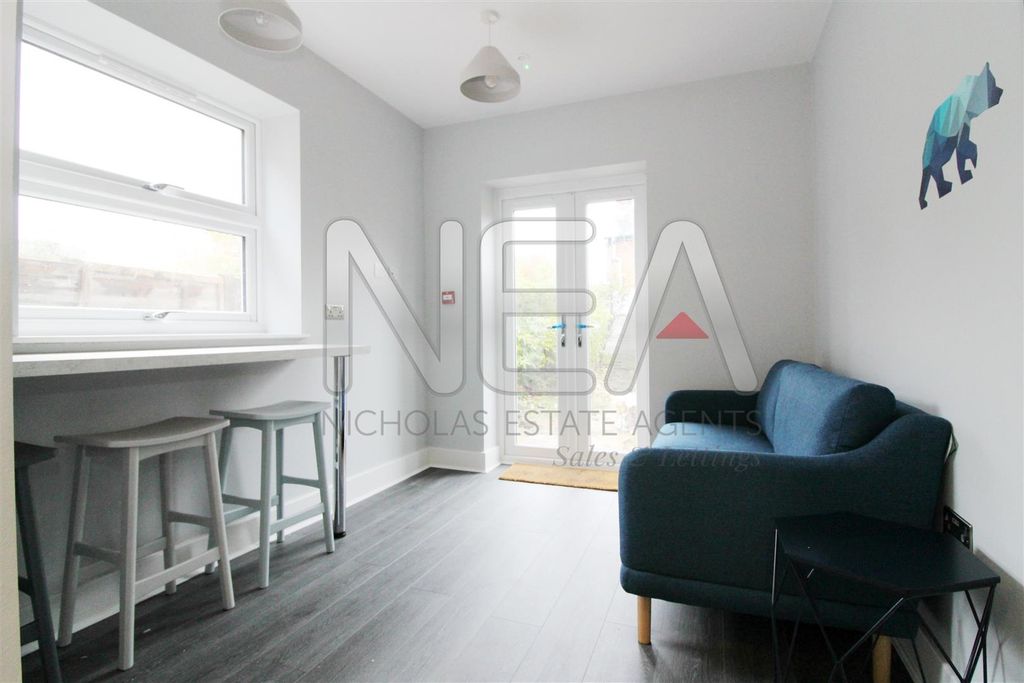 Property photo 3 of 6 Living Room