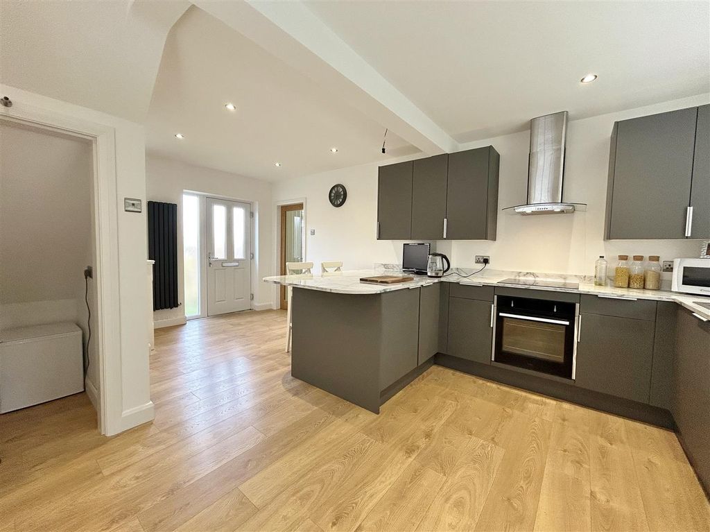 Property photo 2 of 18 Kitchen Area