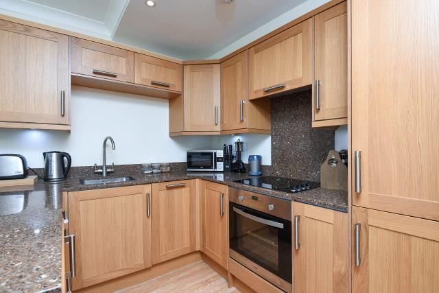 Property photo 3 of 8 Kitchen