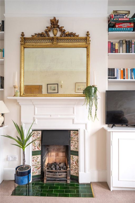 Property photo 3 of 8 Fireplace