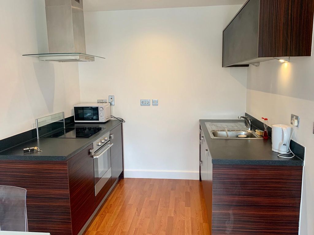 Property photo 2 of 7 Kitchen