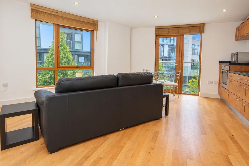 Property photo 3 of 6 Bright Open-Plan Living Area With Large Windows...