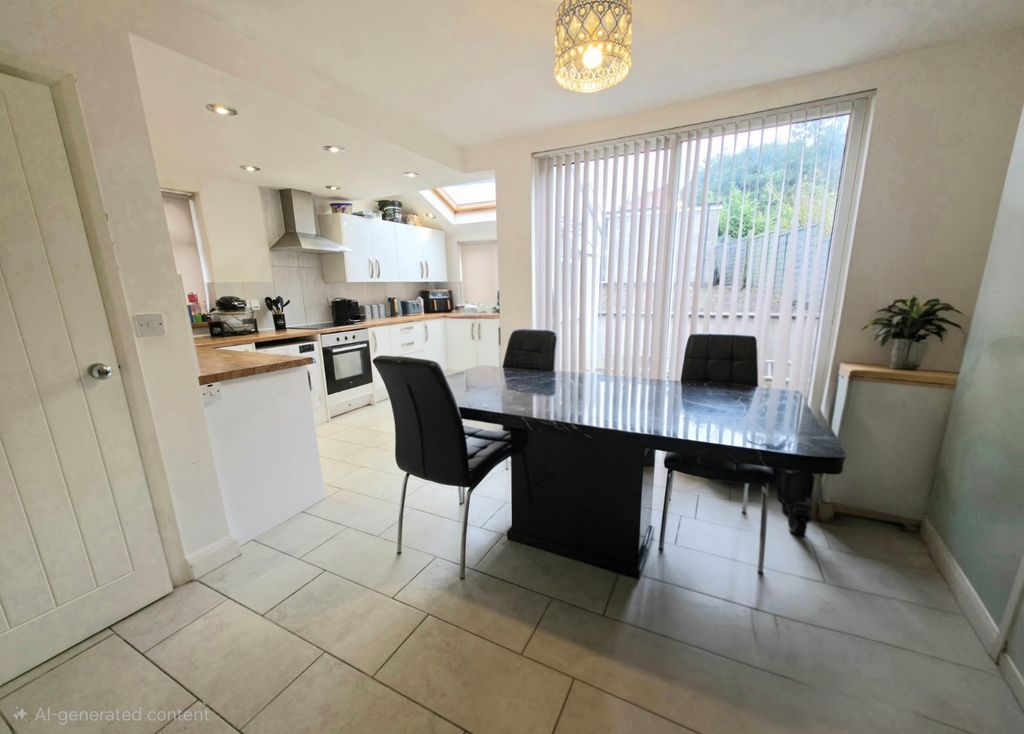 Property photo 3 of 12 Dining Kitchen