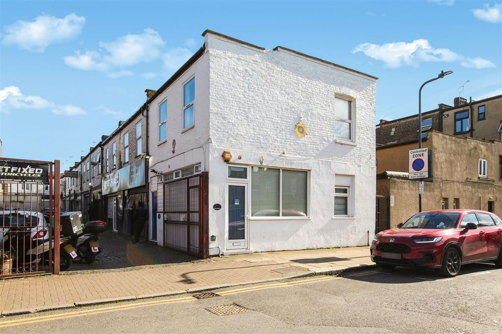 Property photo 1 of 15 Exterior Of Building &amp; Street