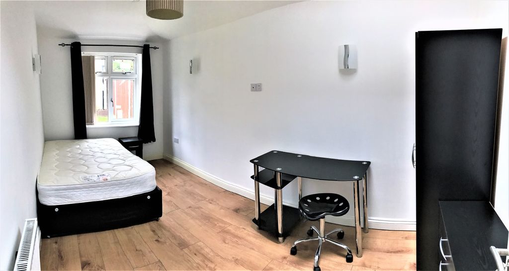 Property photo 1 of 9 Spacious Double Bedroom Featuring A Large Window T...