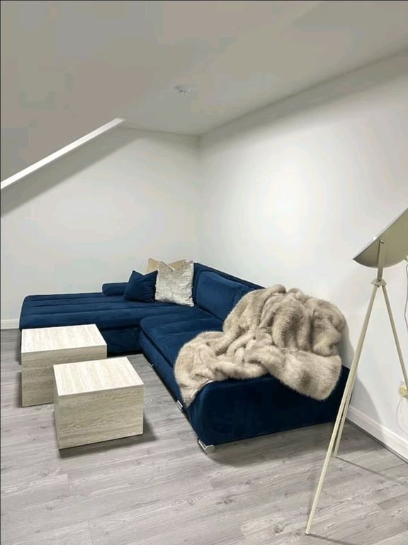 Property photo 2 of 8 Contemporary Living Room Featuring A Stylish Deep ...