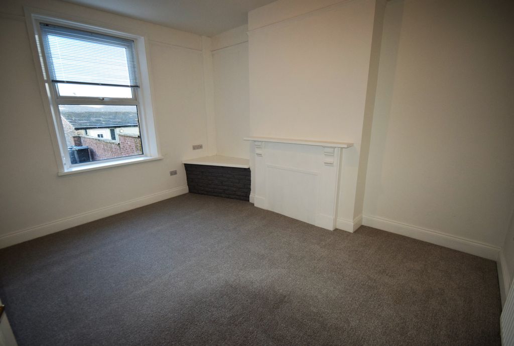 Property photo 3 of 12 Rear Living Room