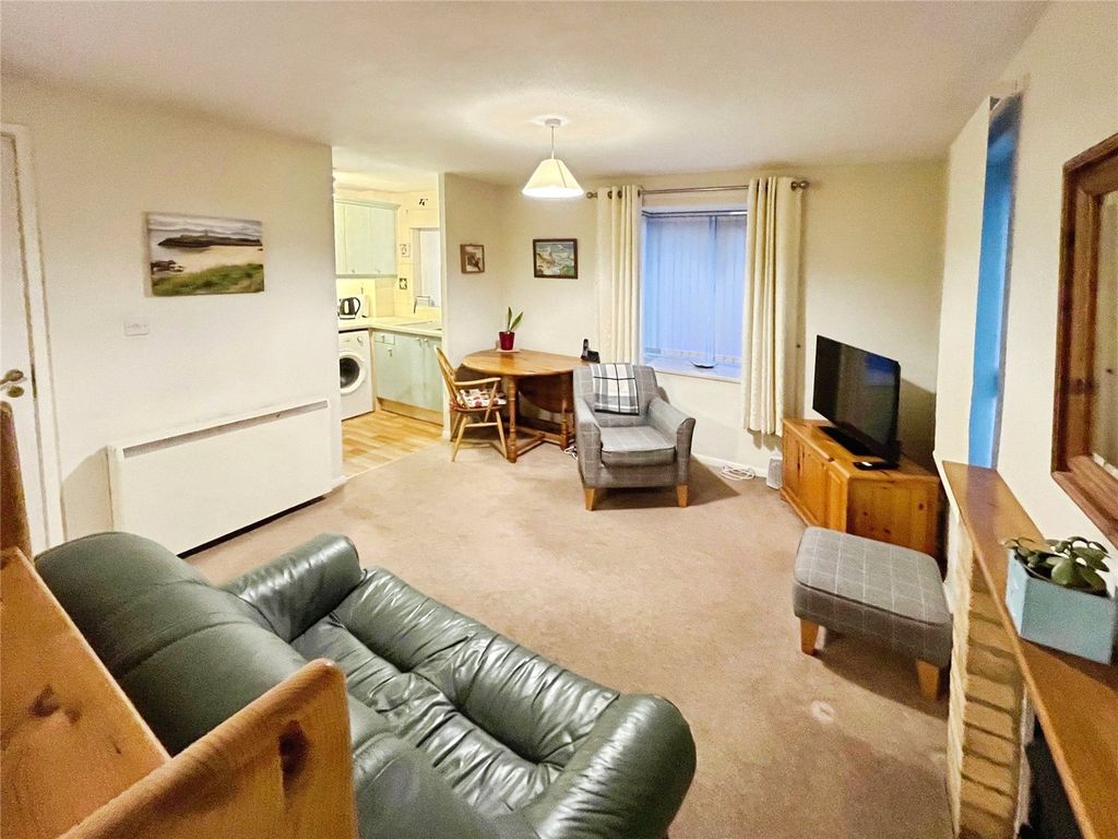 Property photo 2 of 12 Living Area