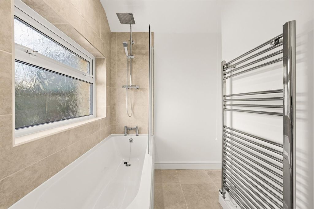 Property photo 3 of 28 Pristine Bathroom With Rainfall Shower And Bath...