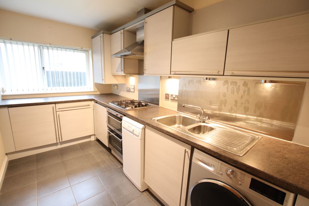 Property photo 3 of 7 Kitchen