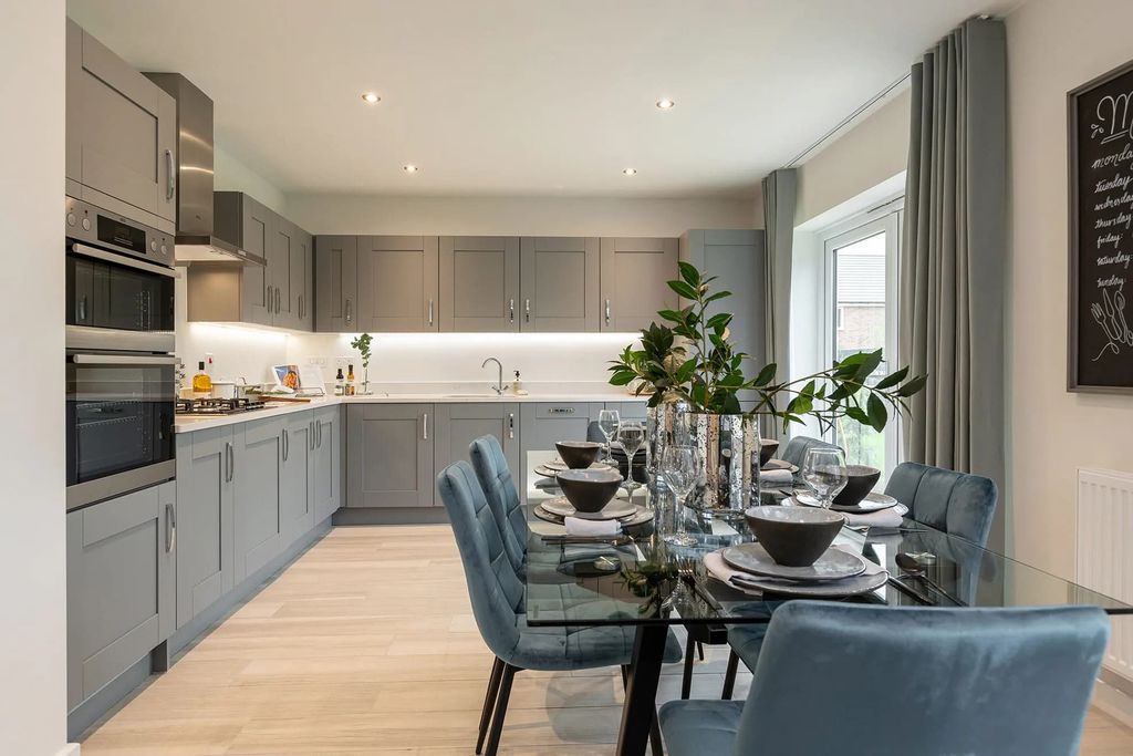 Property photo 2 of 9 A Modern And Stylish Kitchen With Gray Cabinets