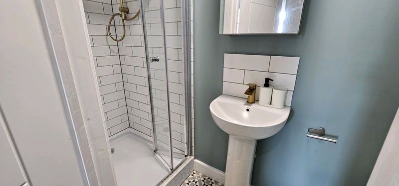 Property photo 3 of 17 A Modern Bathroom Featuring A Spacious Walk-In Sho...