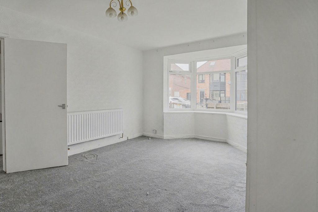 Property photo 3 of 10 20260325063001_28-Sc