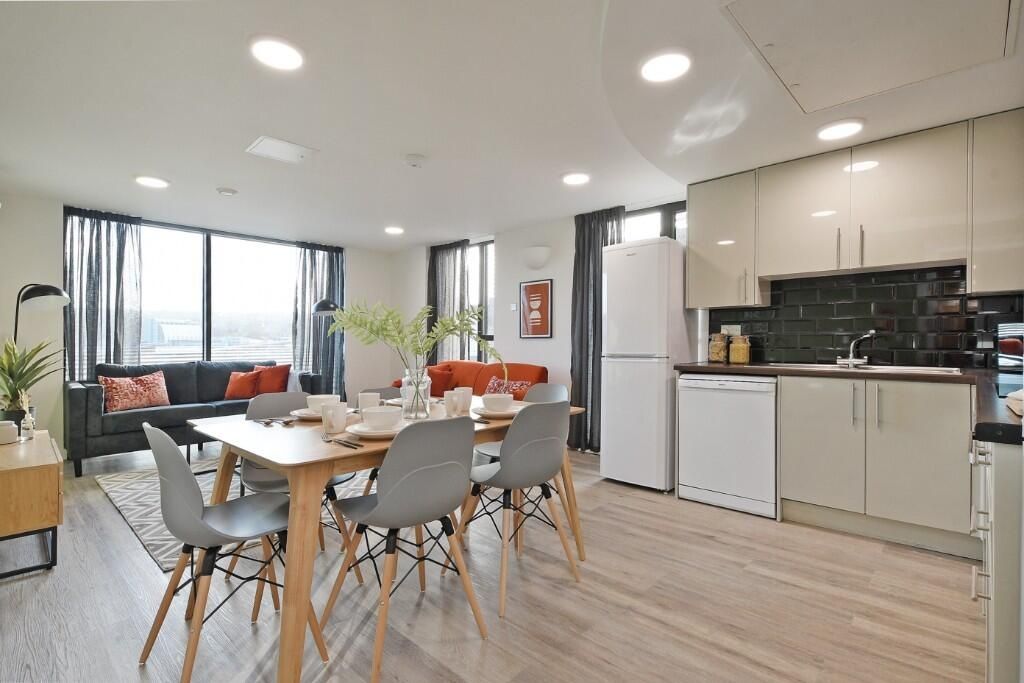 Property photo 2 of 13 A Spacious And Modern Living Room With A Dining Ar...