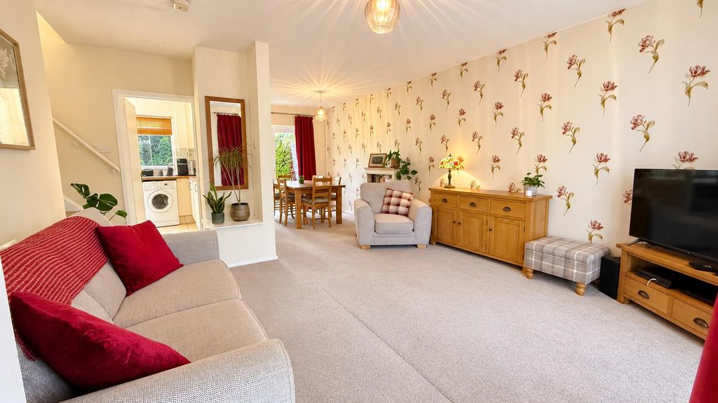 Property photo 2 of 16 Warm Open-Plan Living And Dining Room.Png