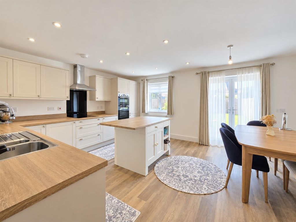 Property photo 3 of 12 Kitchen Dining.Png