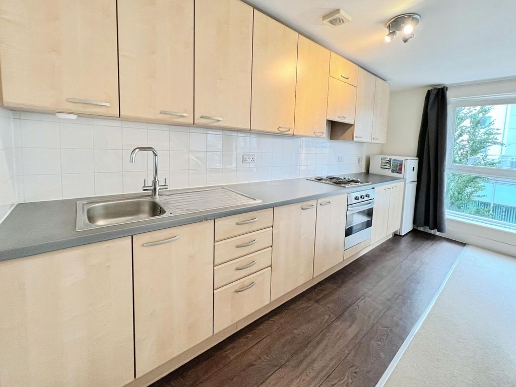 Property photo 3 of 7 Kitchen Area