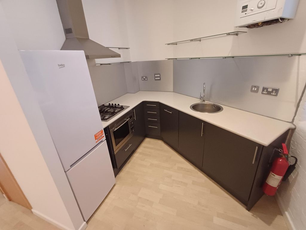 Property photo 2 of 6 Kitchen Area