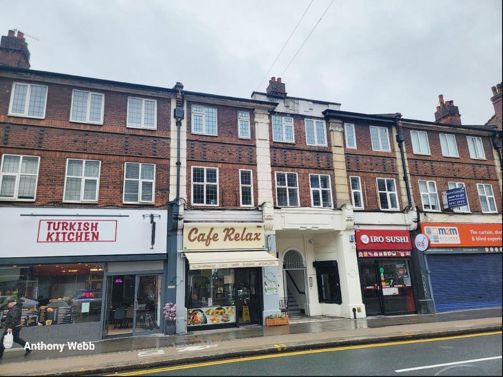 Property photo 3 of 12 Front