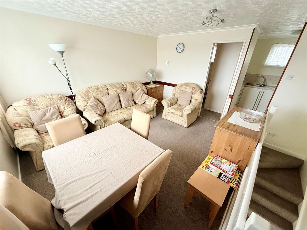 Property photo 3 of 11 Living Room Area