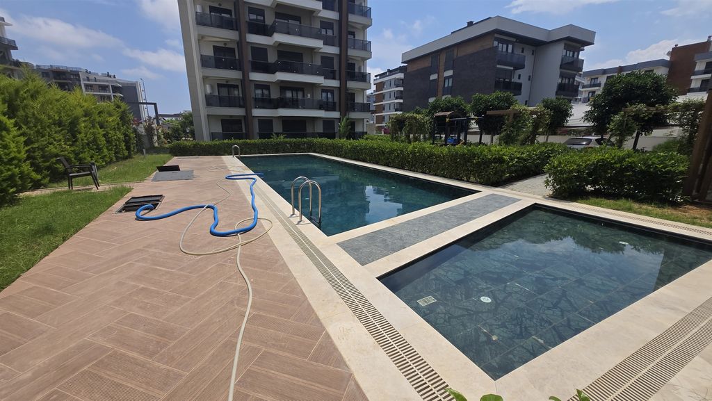 Property photo 3 of 14 Contemporary Antalya Homes In Altintas For Sale - Communal Swimming Pool