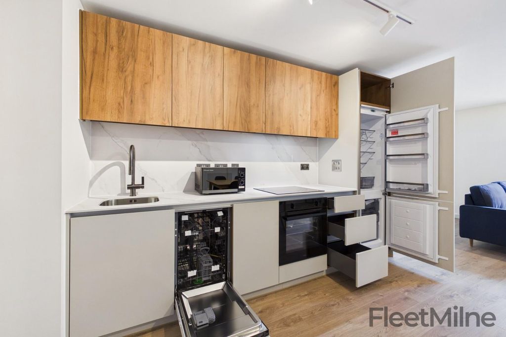 Property photo 3 of 12 Kitchen