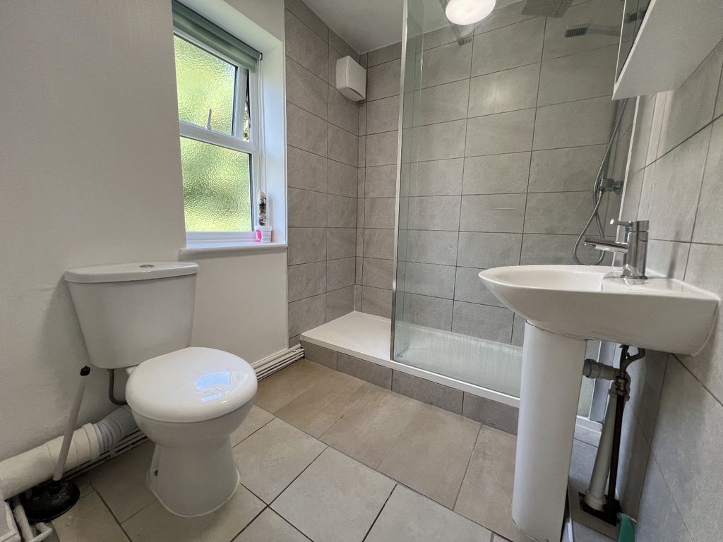 Property photo 3 of 3 Bright And Clean Bathroom Featuring A Toilet, Smal...