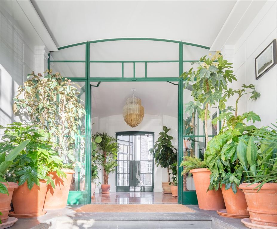 Property photo 3 of 11 Plant-Filled Entrance Hall