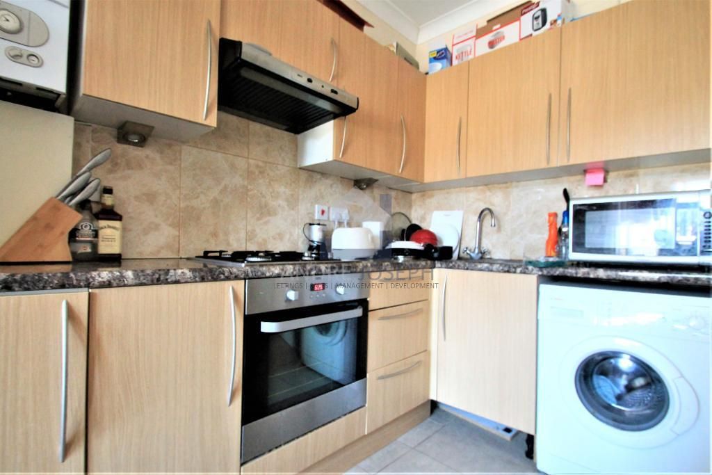 Property photo 1 of 7 Kitchen Area