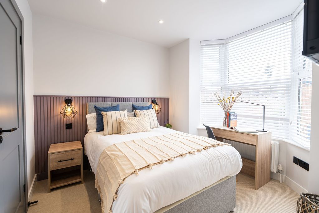 Property photo 3 of 14 A Bright And Inviting Master Bedroom Featuring A c...