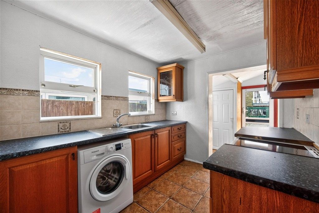 Property photo 2 of 12 Kitchen