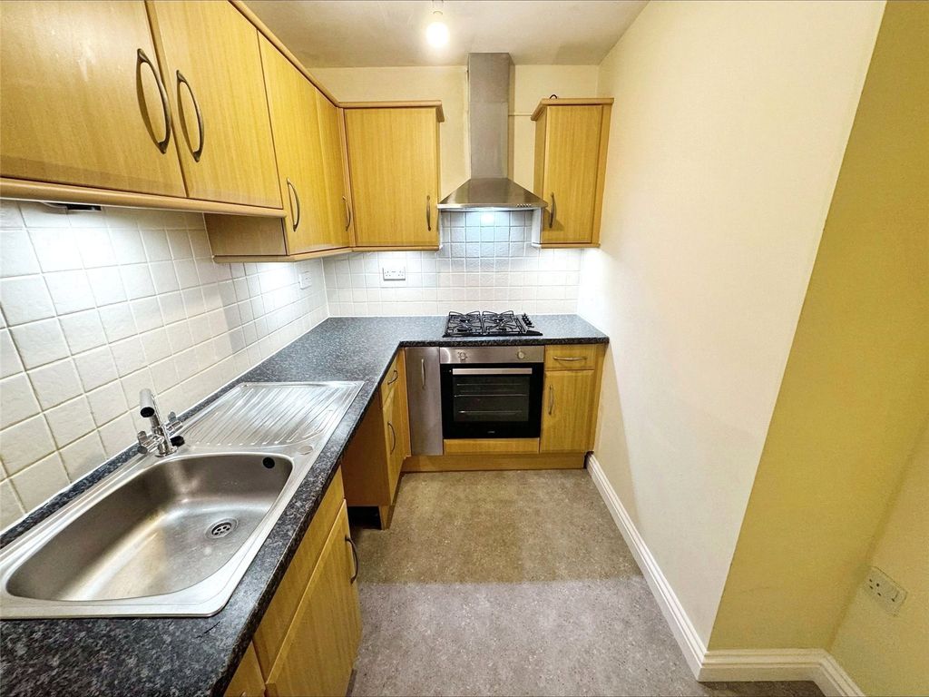 Property photo 3 of 7 Kitchen