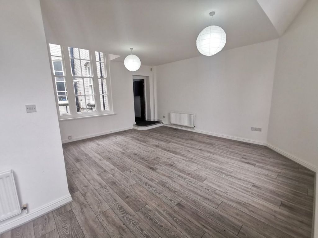 Property photo 1 of 9 Living Area