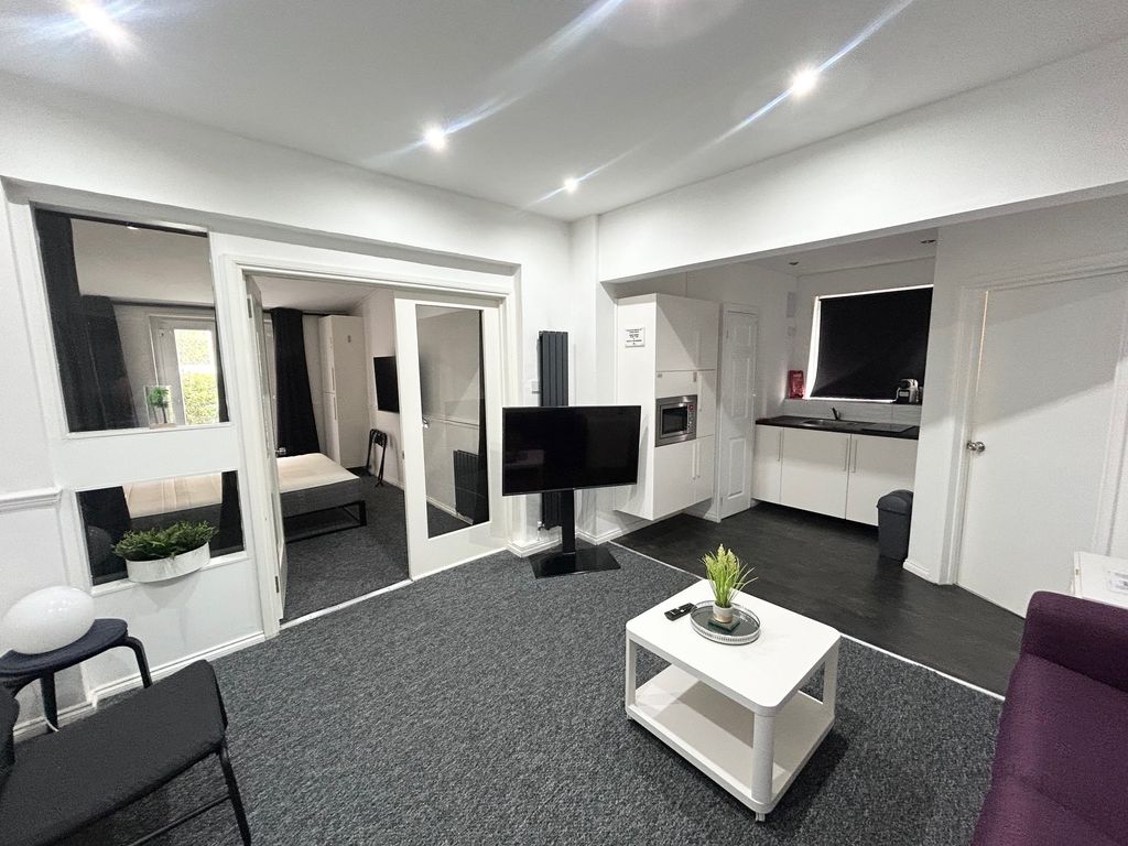 Property photo 2 of 8 Living Area