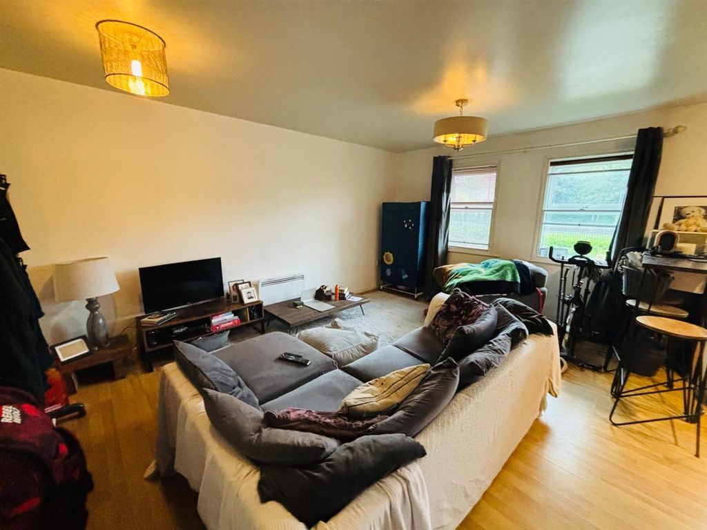 Property photo 2 of 8 Living / Dining Area: