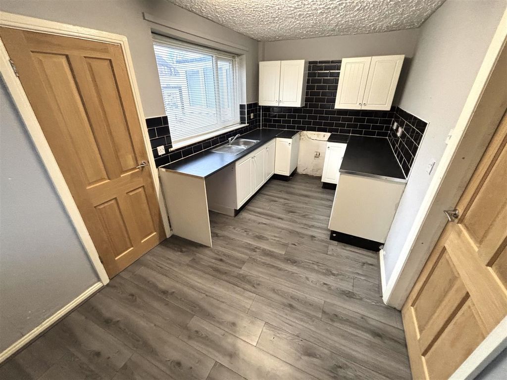 Property photo 3 of 10 Kitchen And Dining Room