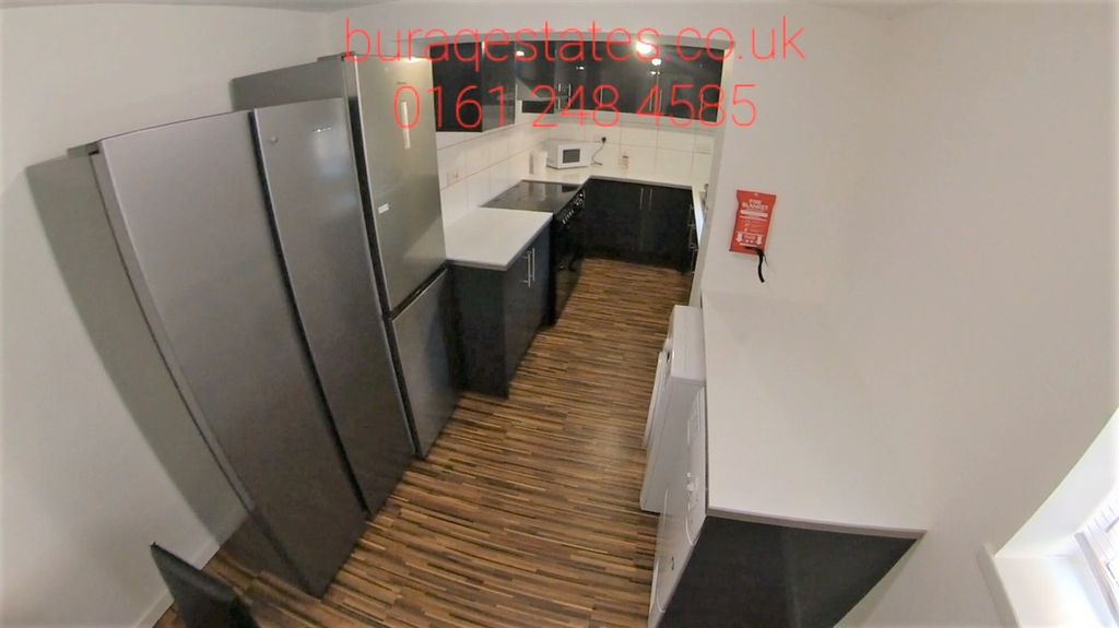 Property photo 3 of 13 Modern Galley Kitchen With Fitted Appliances, Slee...