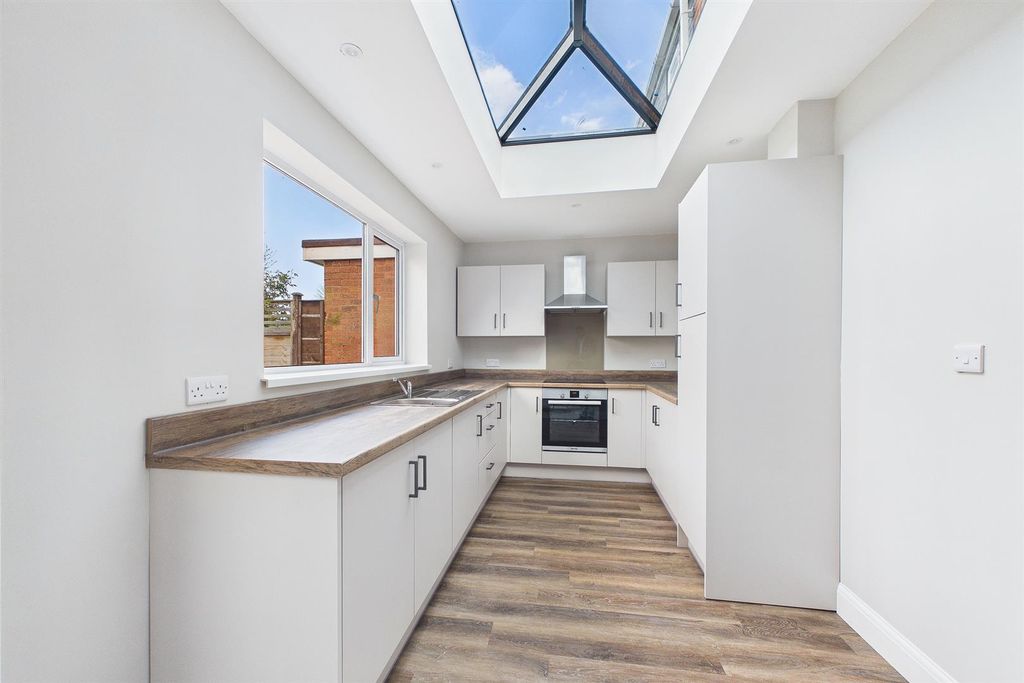 Property photo 2 of 11 Kitchen