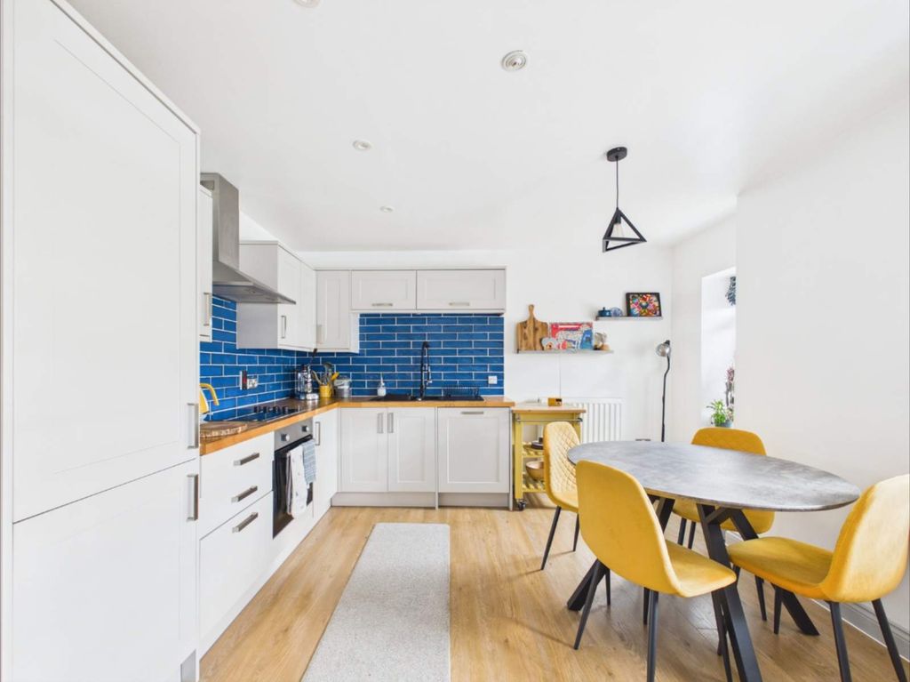 Property photo 3 of 19 Kitchen-Dining Area