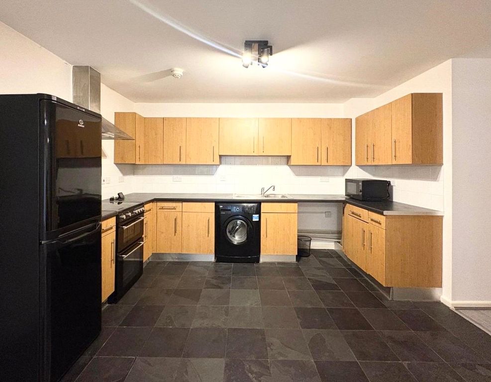 Property photo 3 of 13 Kitchen