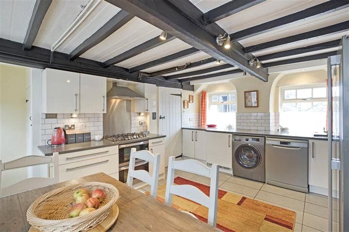 Property photo 3 of 12 Dininf Kitchen